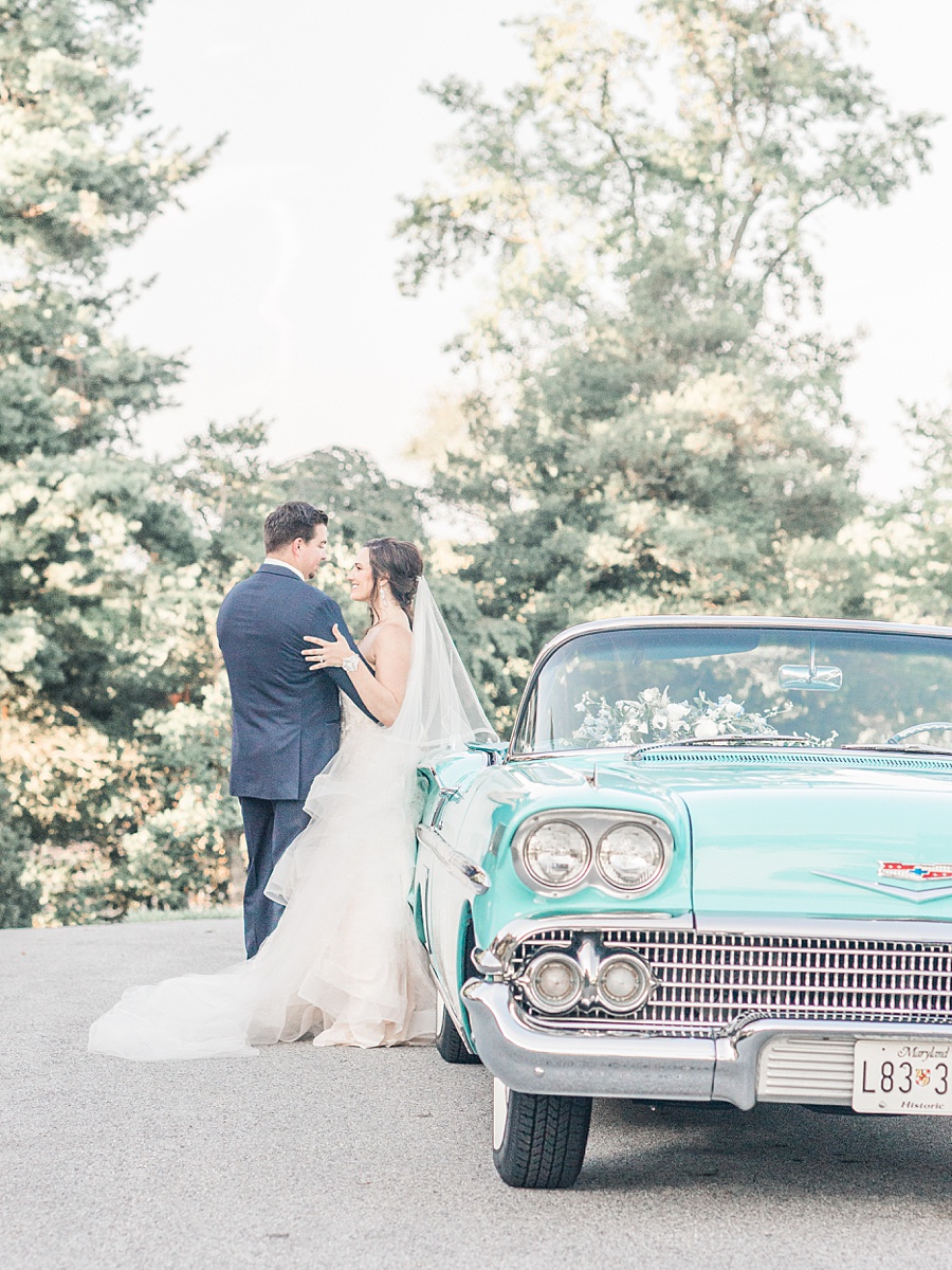 Bride and Groom Portrait with Vintage Car - Romantic Tuscan Inspired Wedding with Ethereal color palette of pale blush, seafoam, pale  grays, dusty blues, champagne and gold by Manda Weaver Photography at Belmont Manor, Elle Ellinghaus Designs, White Glove Rentals, and  My Flower Box