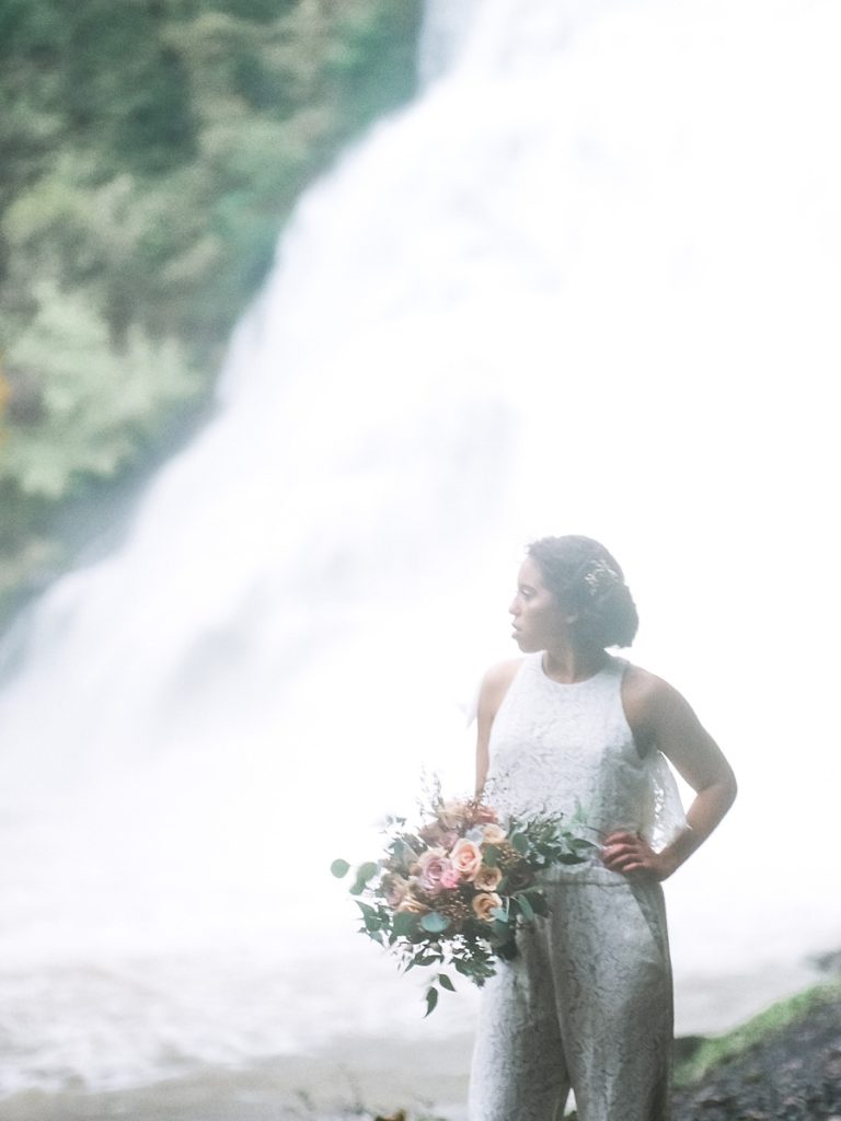 Bride in Jenny Yoo Jumpsuit at Ithaca Falls in Ithaca New York. Photo by New York Wedding Photographer, Manda Weaver Photography